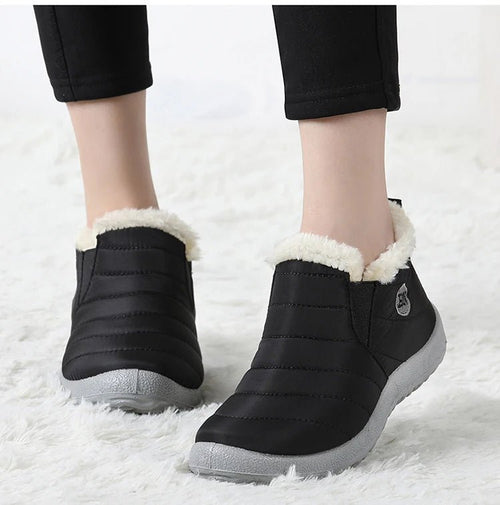 Mandotos INTERNATIONAL men's waterproof winter snow boots, outdoor work shoes, plus size, rugged design with traction soles.
