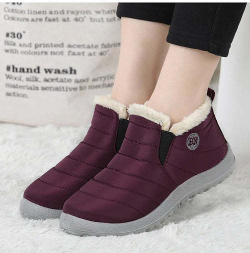 Men's waterproof winter snow boots by MANDOTOS INTERNATIONAL, outdoor work shoes, plus size, with rugged soles for cold weather.