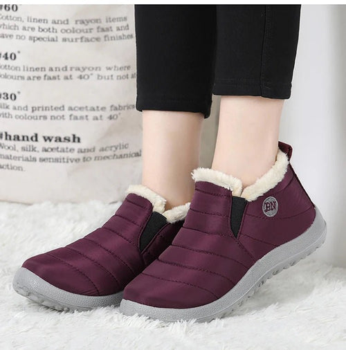 Men's waterproof winter snow boots by MANDOTOS INTERNATIONAL, outdoor work shoes with sturdy soles and plus-size fit.
