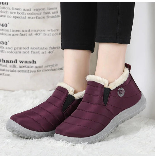 Men's waterproof winter snow boots by MANDOTOS INTERNATIONAL, outdoor work shoes with sturdy soles and plus-size fit.