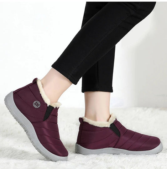 Men's waterproof winter snow boots by MANDOTOS INTERNATIONAL, outdoor work shoes with sturdy design and plus size fit.