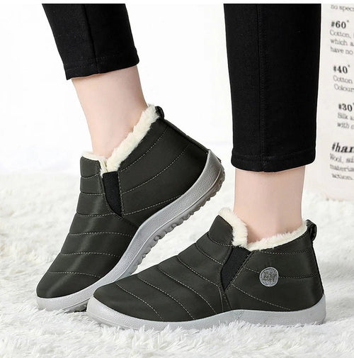 Men's waterproof winter snow boots by MANDOTOS INTERNATIONAL, outdoor work shoes in plus size with rugged design and sturdy soles.