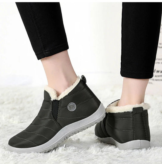 Men's waterproof winter snow boots by MANDOTOS INTERNATIONAL, outdoor work shoes in plus size with rugged soles and insulated lining.