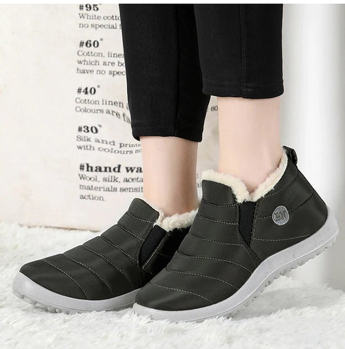 Men's waterproof winter snow boots by MANDOTOS INTERNATIONAL, outdoor work shoes in plus size with rugged traction and insulated design.