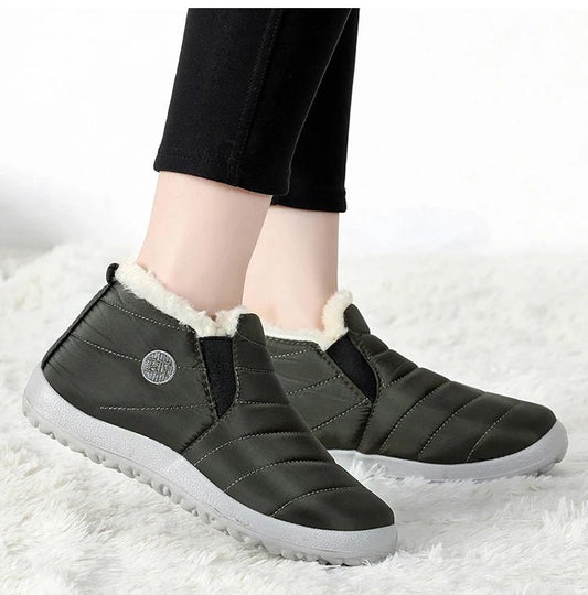 Men's waterproof winter snow boots by MANDOTOS INTERNATIONAL, outdoor work shoes in plus size with rugged traction and insulated lining.