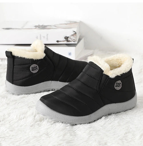 Men's waterproof winter snow boots by MANDOTOS INTERNATIONAL, outdoor work shoes, plus size, durable with rugged tread for winter conditions.