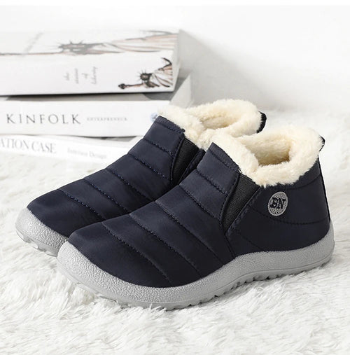 Men's waterproof winter snow boots by MANDOTOS INTERNATIONAL, outdoor work shoes in plus size with rugged sole and insulated design.