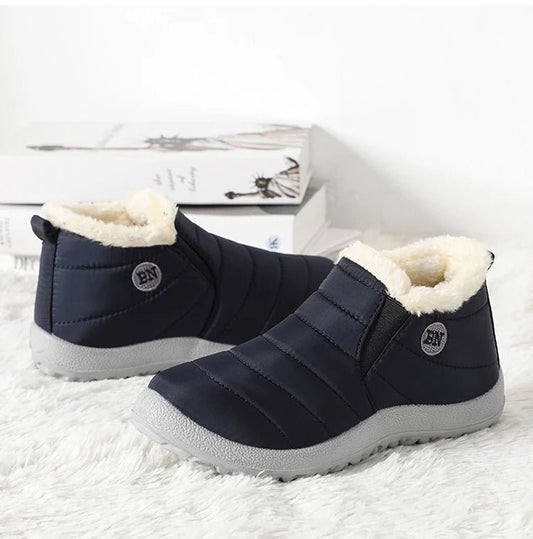 Men's waterproof winter snow boots by MANDOTOS INTERNATIONAL, outdoor work shoes in plus size with rugged outsole and warm lining.