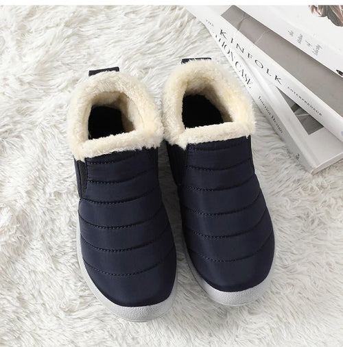 Men's waterproof winter snow boots by MANDOTOS INTERNATIONAL, outdoor work shoes in plus size, rugged design for cold weather.