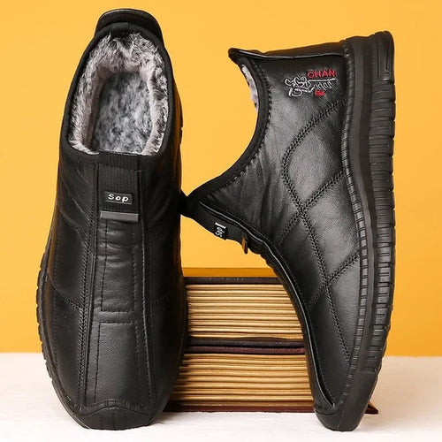 Men's waterproof winter boots by MANDOTOS INTERNATIONAL with non-slip soles and platform design, available in sizes 38-48.
