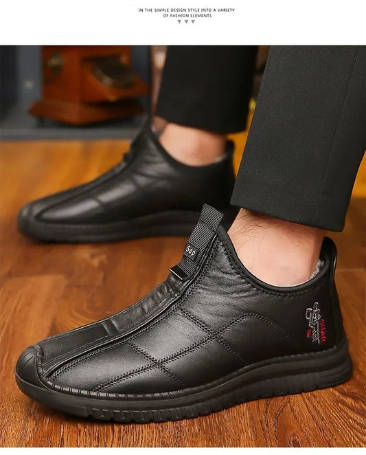 Men's winter waterproof non-slip platform work boots by Mandotos International, size 38-48, shown with sturdy design and traction soles.