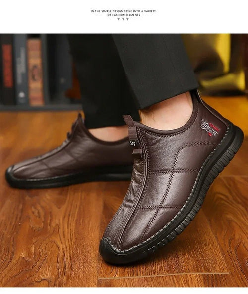 Men's winter waterproof non-slip platform work boots by MANDOTOS INTERNATIONAL, size 38-48, with sturdy soles and insulated design.