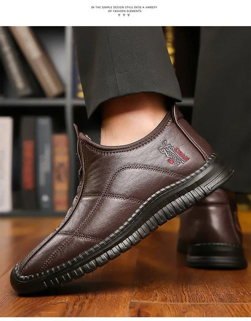 Men's winter waterproof non-slip platform work boots by MANDOTOS INTERNATIONAL, size 38-48, showing sturdy sole and waterproof upper.
