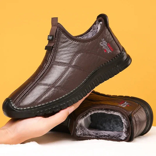 Men's waterproof winter boots by MANDOTOS International, non-slip platform work shoes, size 38-48, with sturdy design and rugged soles.