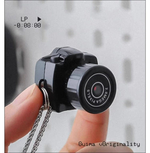 Miniature necklace camera by Mandotos International for kids, recording videos and vlogs discreetly with a compact design.