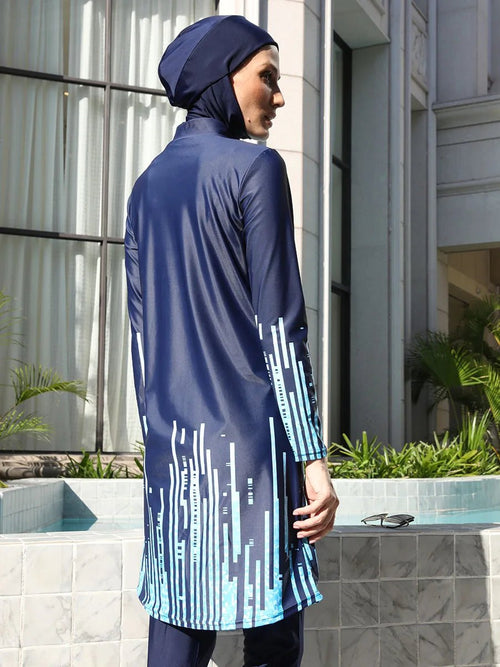 Mandotos International modest Muslim burkini with full coverage, stylish design, and functional swimwear for middle-aged women, in navy blue.