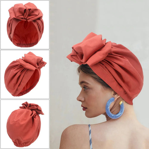 Muslim-style mirror hats and African headgear for women featuring intricate designs and vibrant patterns by MANDOTOS INTERNATIONAL.