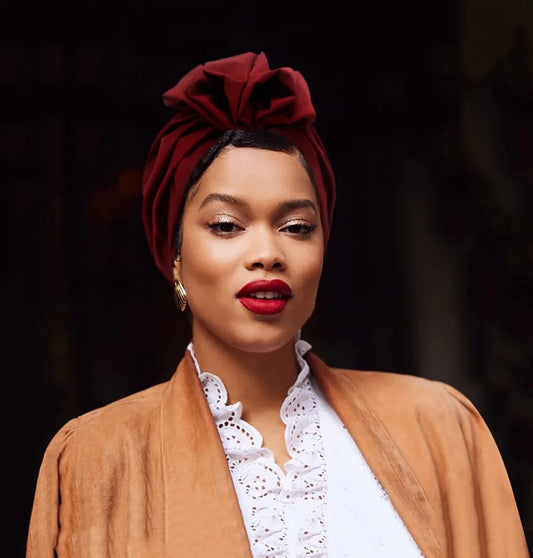Muslim-style mirror hats and African headgear for women with intricate patterns and embellishments by MANDOTOS INTERNATIONAL.