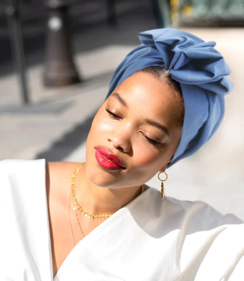 Muslim-style mirror hats and African headgear for women, featuring intricate designs and vibrant patterns by MANDOTOS INTERNATIONAL.