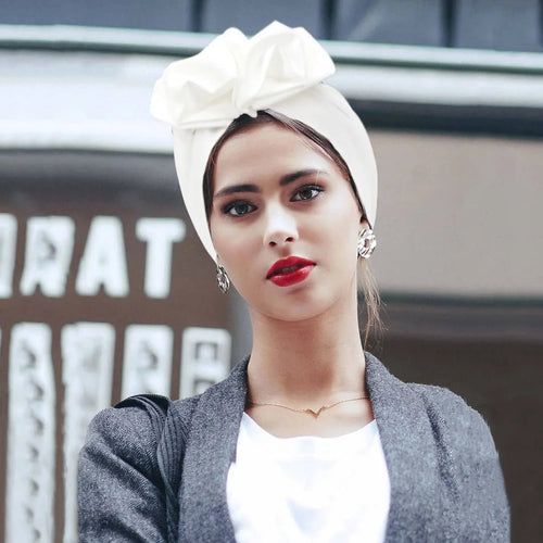 Muslim-style mirror hats and African headgear for women, featuring intricate designs and reflective mirror embellishments.