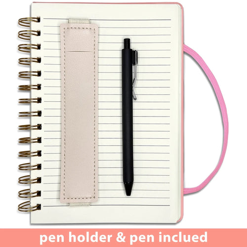 Pink girls' A5 travel leather spiral notebook by MANDOTOS INTERNATIONAL with pen holder and matching pen for writing.