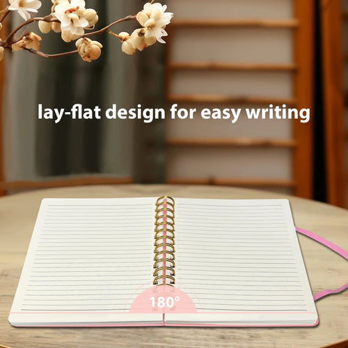 Pink girls' A5 travel leather spiral notebook with pen holder and pen, ideal for writing and note-taking.