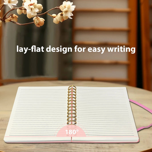 Pink girls' A5 travel leather spiral notebook with pen holder and pen, ideal for writing and note-taking.