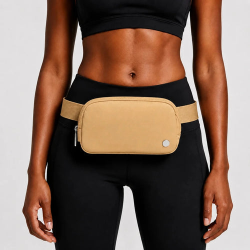 Mandotos International premium lightweight women’s waist bag for running and travel, shown in black with adjustable strap.