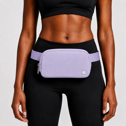 Mandotos International premium lightweight women's waist bag for running and travel, shown in black with adjustable strap.