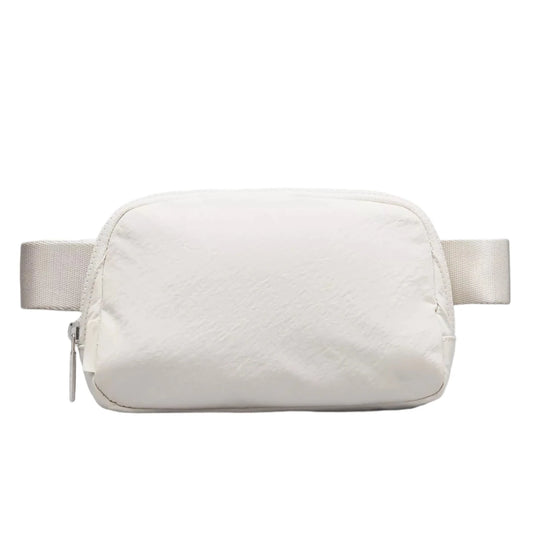 Lightweight women's waist bag by Mandotos International, ideal for running and travel, shown with adjustable strap and secure zipper.