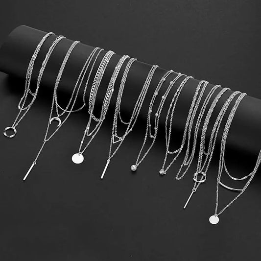 Mandotos International retro geometric pendant necklace, stylish jewelry piece for trendy travel dates, featuring modern design elements.