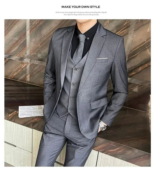 Mandotos International men's formal dress suit with navy blazer, vest, and matching pants, perfect for business or special occasions.