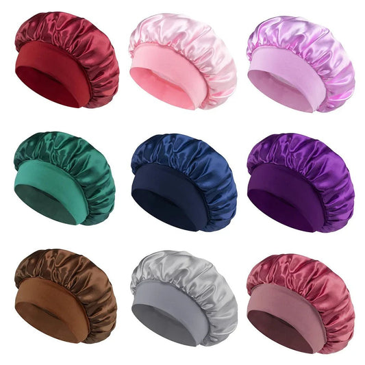 Silk wide-brimmed satin sleeping bonnet for women, designed for hair care and protection during sleep, from MANDOTOS INTERNATIONAL.
