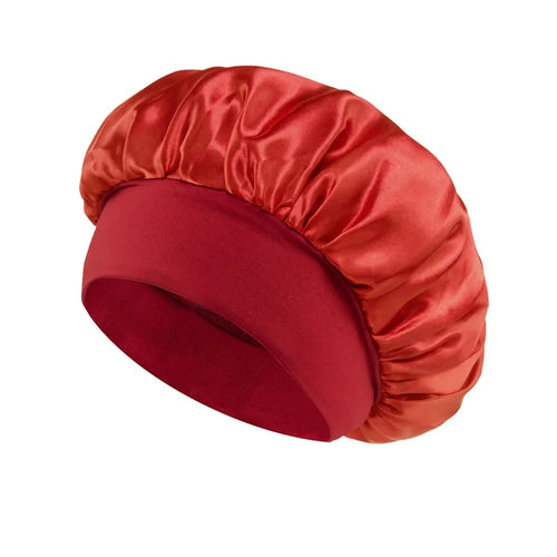 Silk wide-brimmed satin sleep bonnet for women, designed to protect and care for hair overnight from MANDOTOS INTERNATIONAL.