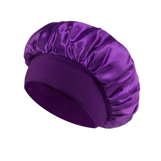 Silk wide-brimmed satin sleeping bonnet for women, designed to protect and care for hair during sleep.