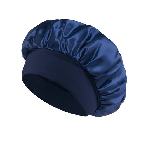 Silk wide-brimmed satin sleeping bonnet for women, designed to protect hair during sleep, by MANDOTOS INTERNATIONAL.
