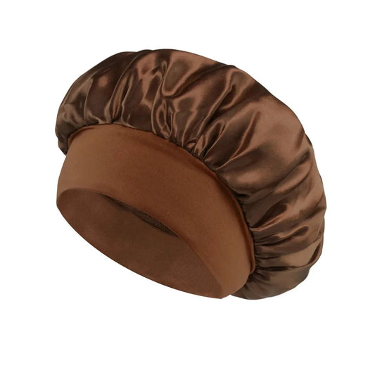 Silk wide-brimmed satin sleeping bonnet for women, designed to protect hair during sleep from MANDOTOS INTERNATIONAL.
