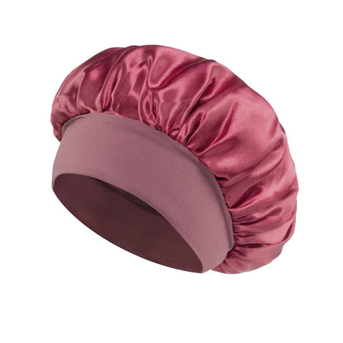 Silk wide-brimmed sleeping bonnet for women from MANDOTOS INTERNATIONAL, satin hair care bonnet with a comfortable fit.