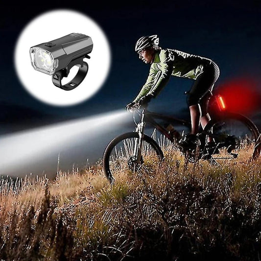 Mandotos International super bright LED bicycle front light mounted on a bike for night riding visibility and safety.