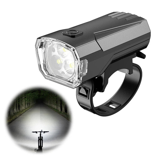 Super Bright LED Bicycle Front Light by MANDOTOS INTERNATIONAL for night riding, mounted on a bicycle handlebar.