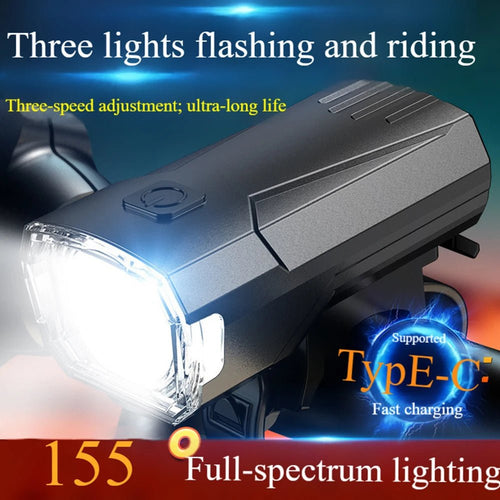 Mandotos International super bright LED bicycle front light attached to a bike handlebar for night riding visibility.