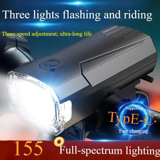 Mandotos International super bright LED bicycle front light attached to a bike handlebar for night riding visibility.