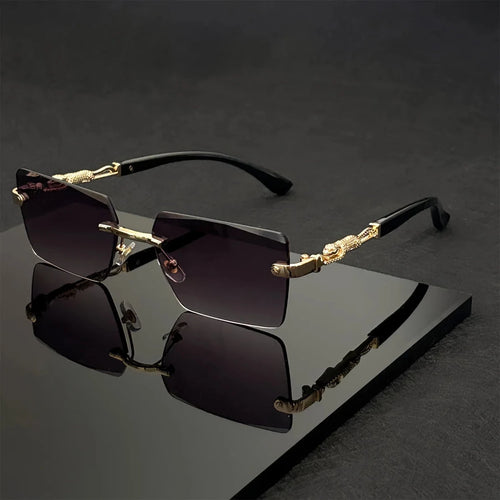 Unisex luxury frameless black and gold sunglasses with leopard print, rectangular lenses, UV400 protection, elegant design