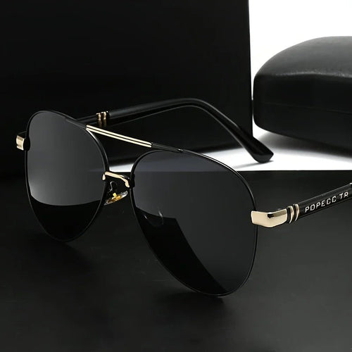 Unisex polarized stylish eyewear by Mandotos International, suitable for travel and driving, with sleek frame and tinted lenses.