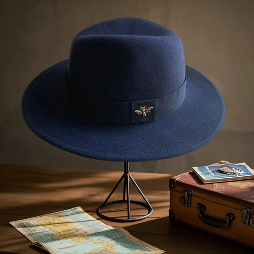 Vintage wool fedora with feather band from MANDOTOS INTERNATIONAL, ideal for formal events and weddings.
