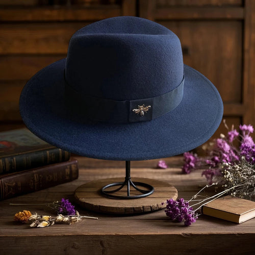 Vintage wool fedora with feather band by MANDOTOS INTERNATIONAL, ideal for formal events and weddings.