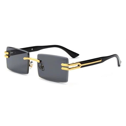 Vintage rimless sunglasses with stylish PC frames by MANDOTOS INTERNATIONAL, showcasing sleek, modern eyewear design.