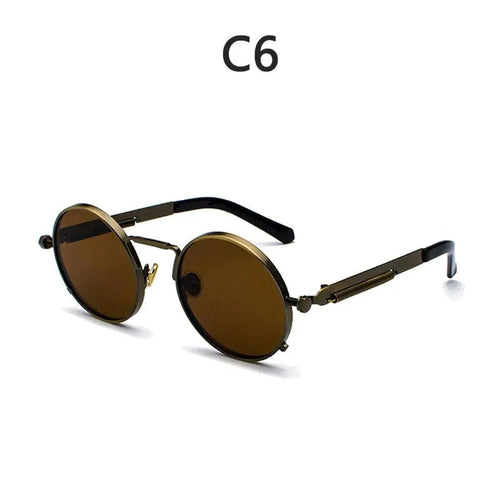 Vintage steampunk circular shades by MANDOTOS INTERNATIONAL with round metal frames and tinted lenses.