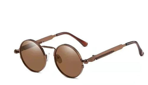 Vintage steampunk circular shades by MANDOTOS INTERNATIONAL featuring round metal frames and tinted lenses.