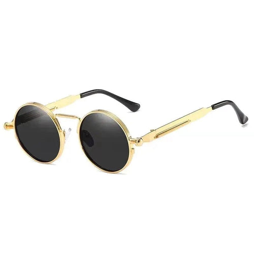 Vintage steampunk circular sunglasses by MANDOTOS INTERNATIONAL with metal frames and tinted lenses.